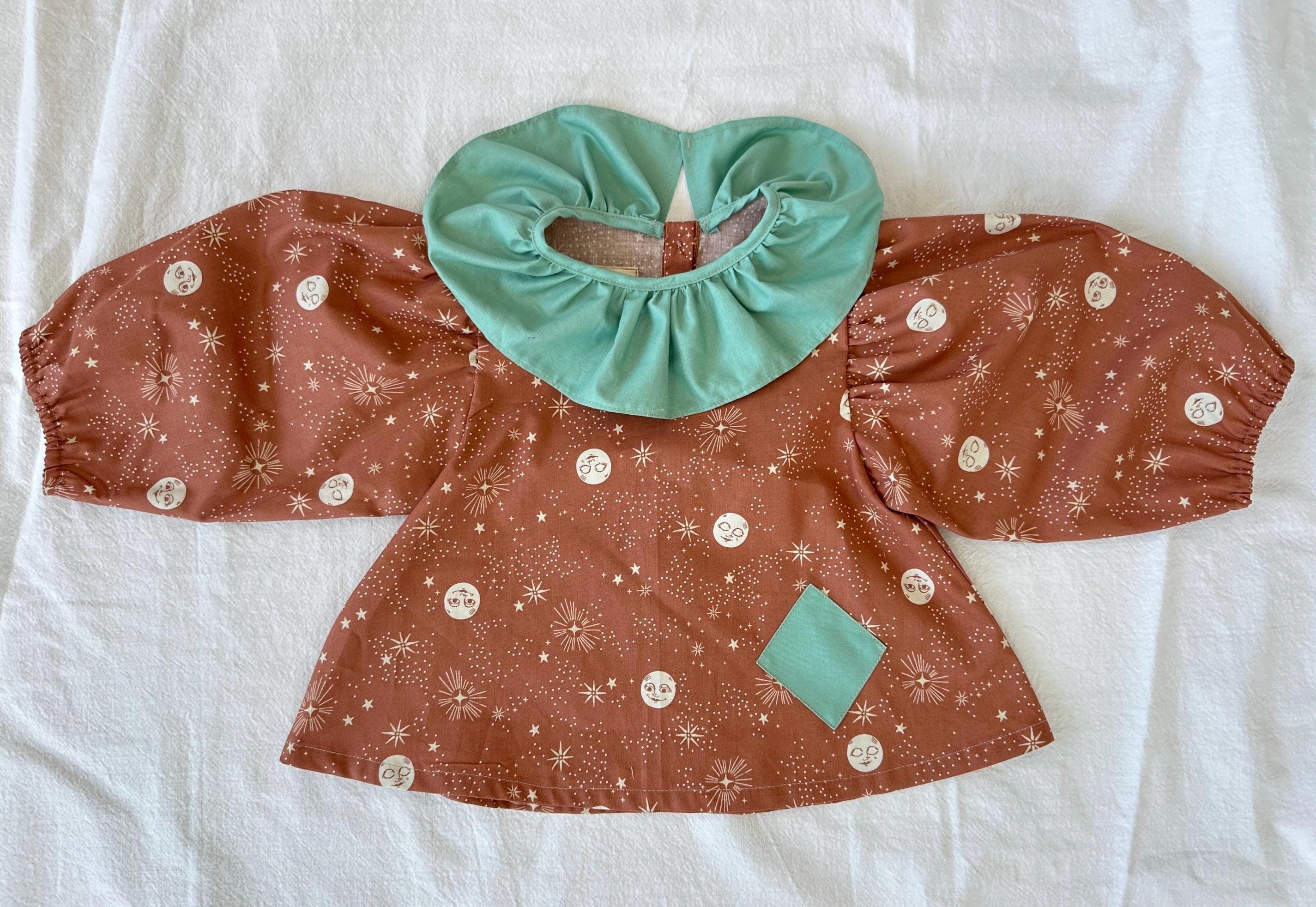 Good Spirit (Terracotta) Blouse: Ruffle Neck, with a diamond Patch (0-7Y)